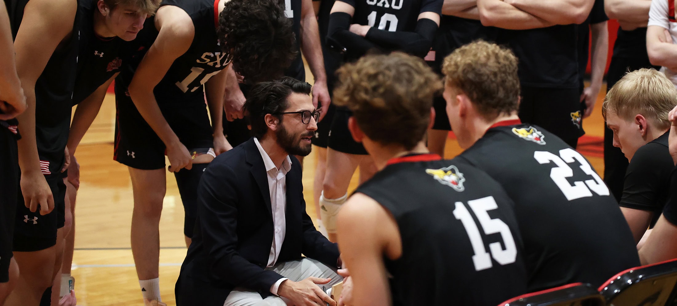 Tom Ryan of St. Xavier University is the 2025 AVCA Coach of the Year for NAIA men's volleyball.